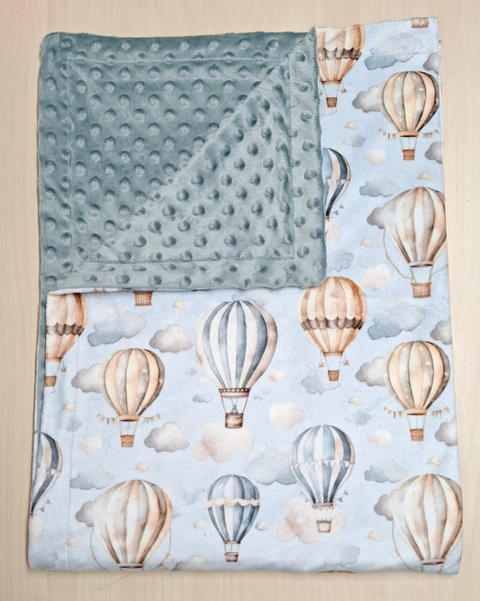 Couverture Montgolfières dans les nuages bleu