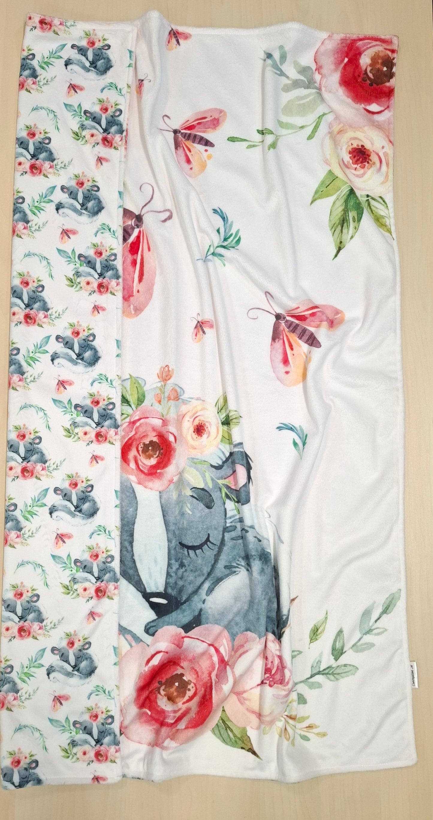 Couverture panneau Moufette fleuris