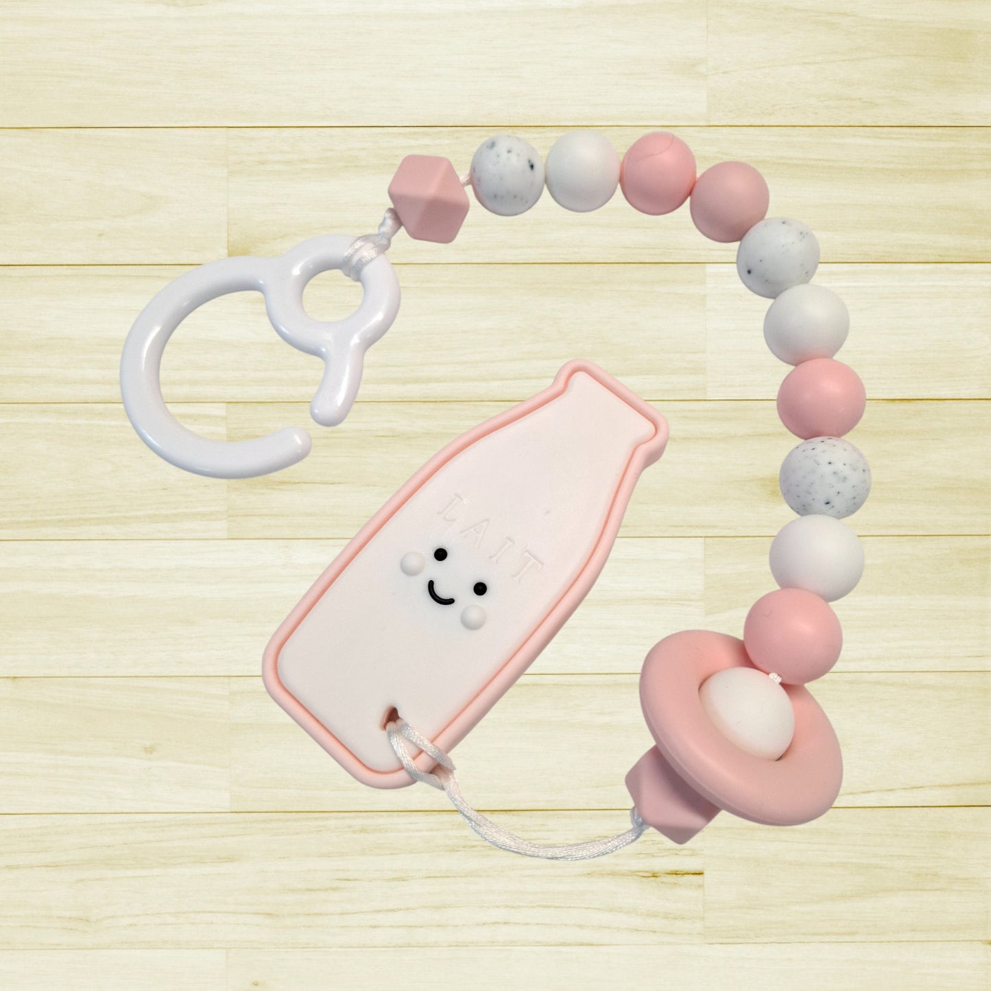 Jouet de poussette Lait rose