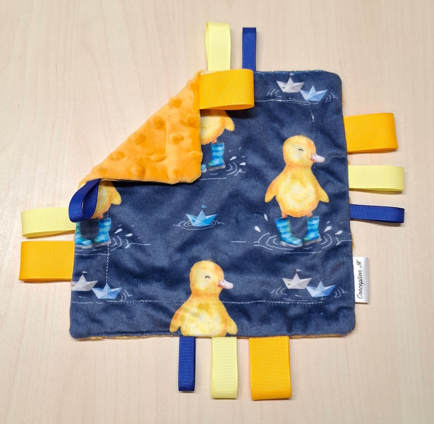 Mini Caneton sous la pluie