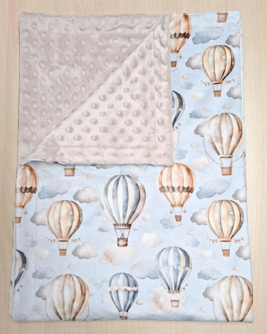 Couverture Montgolfières dans les nuages bleu