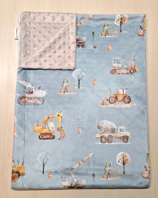 Couverture Camion et tracteur en chantier de construction